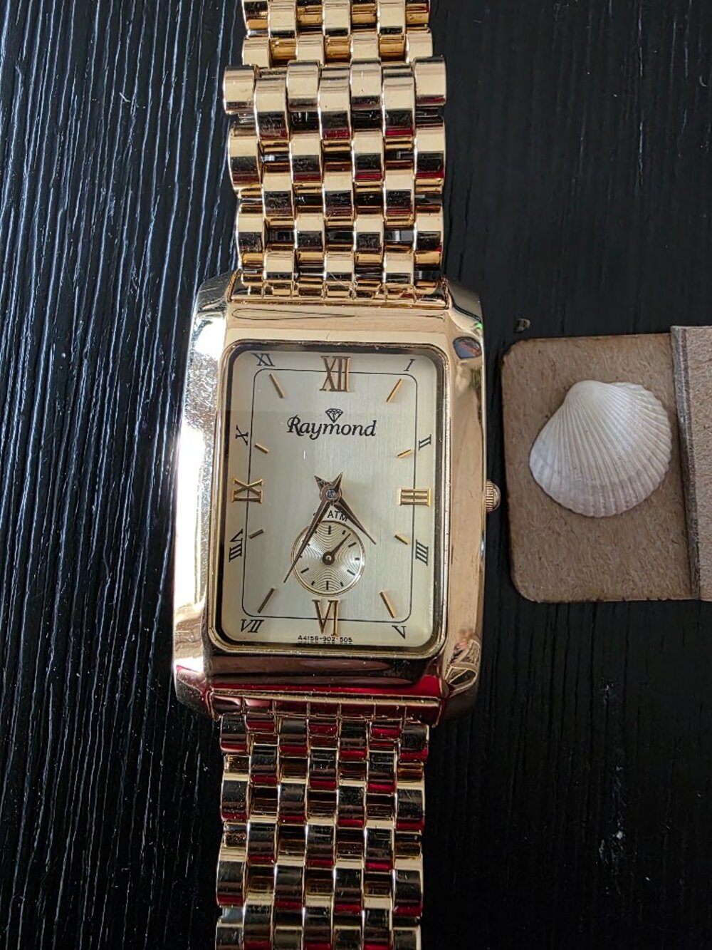 Item #W118 Raymond gold tone 9.5 in Watch